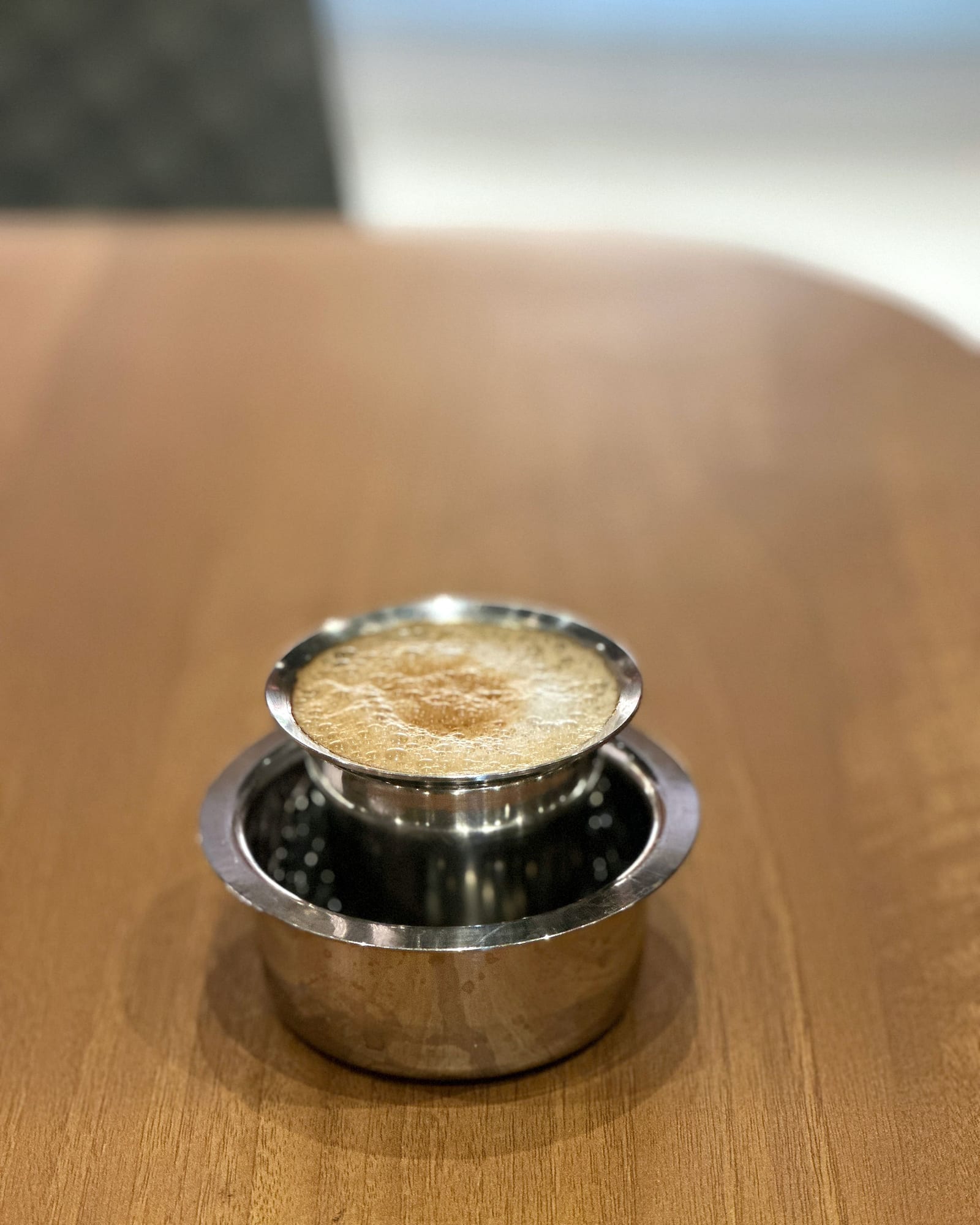 South Indian filter coffee served in a steel dabara set