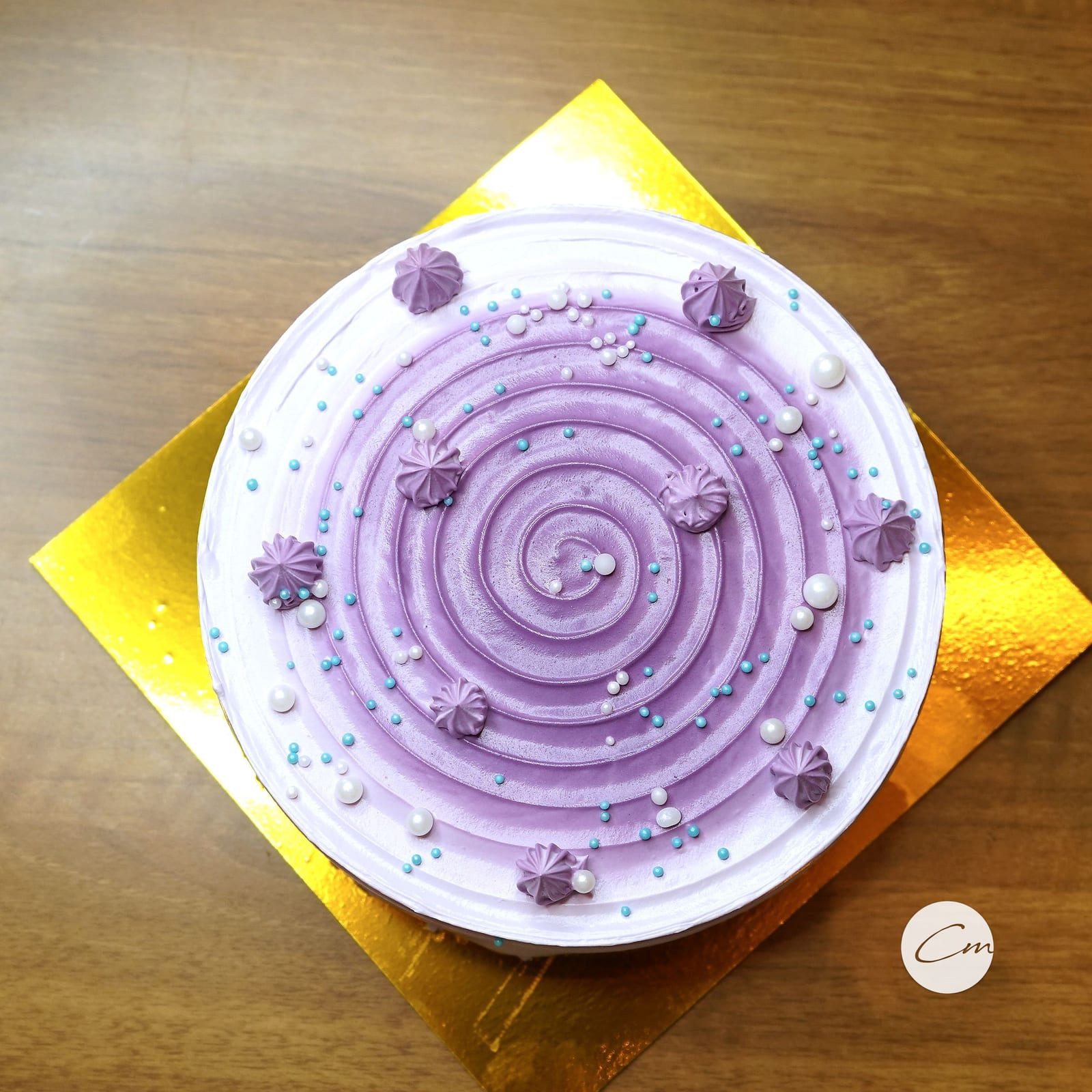 A blueberry cream cake photographed from above
