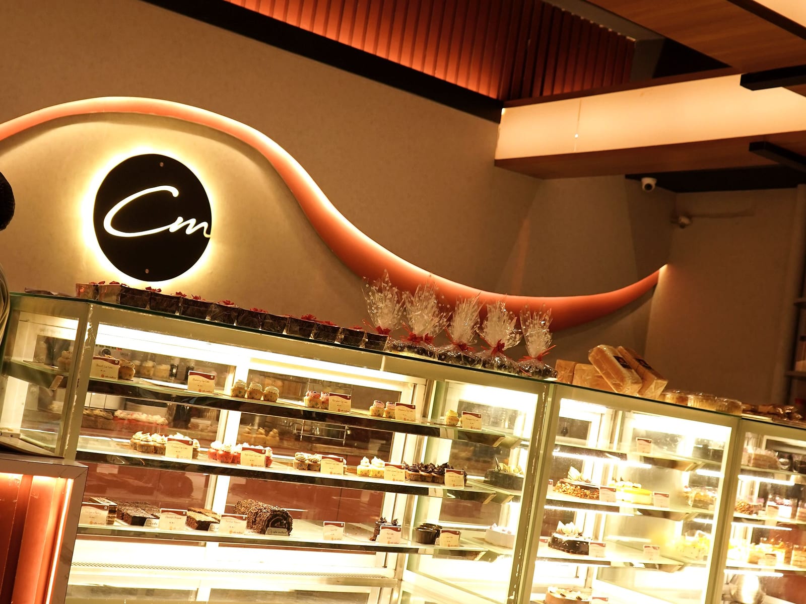 The pastry counter at Café Mellow seen from the seating side