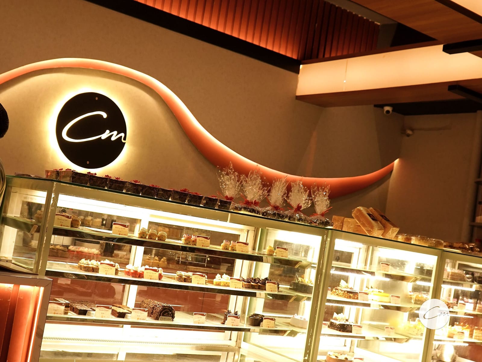The pastry counter at Café Mellow seen from the seating side