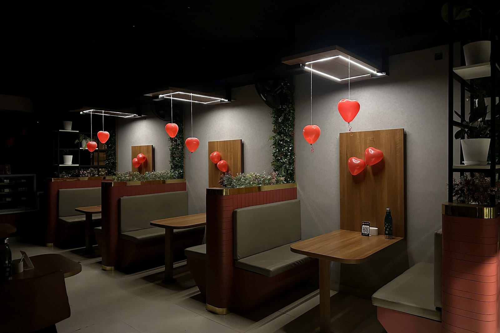 Booth seating at Café Mellow, dressed for Valentine's Day